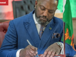 RodneyS ikumba Minister of Tourism of Zambia signing ZIMOZA TFCA