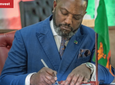 RodneyS ikumba Minister of Tourism of Zambia signing ZIMOZA TFCA